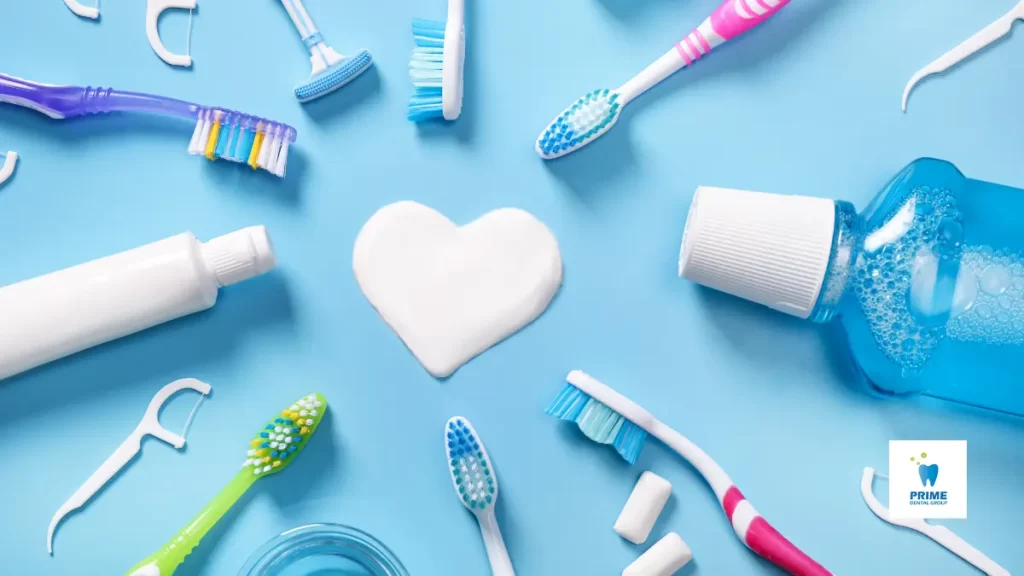 Dental care essentials including toothbrushes, toothpaste, floss, and mouthwash on a blue background.