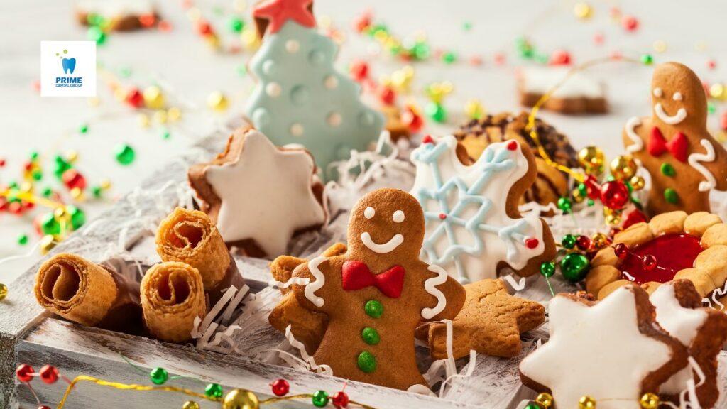 Holiday cookies and treats on a festive tray with colorful decorations.